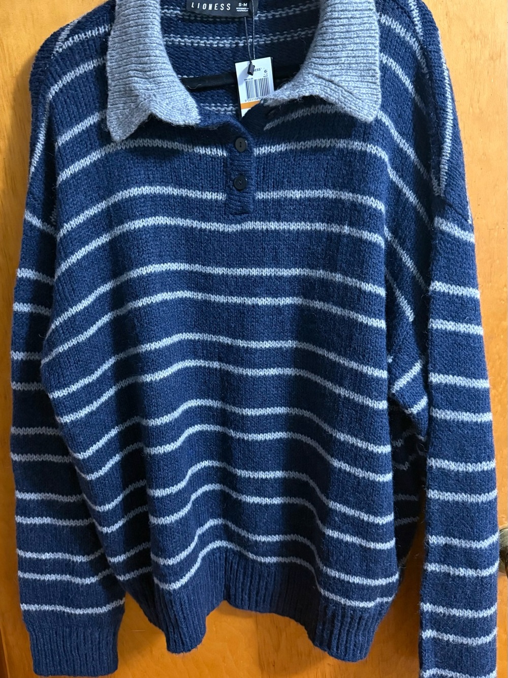 Lioness Navy Sweater with Light Gray Stripes and Collar